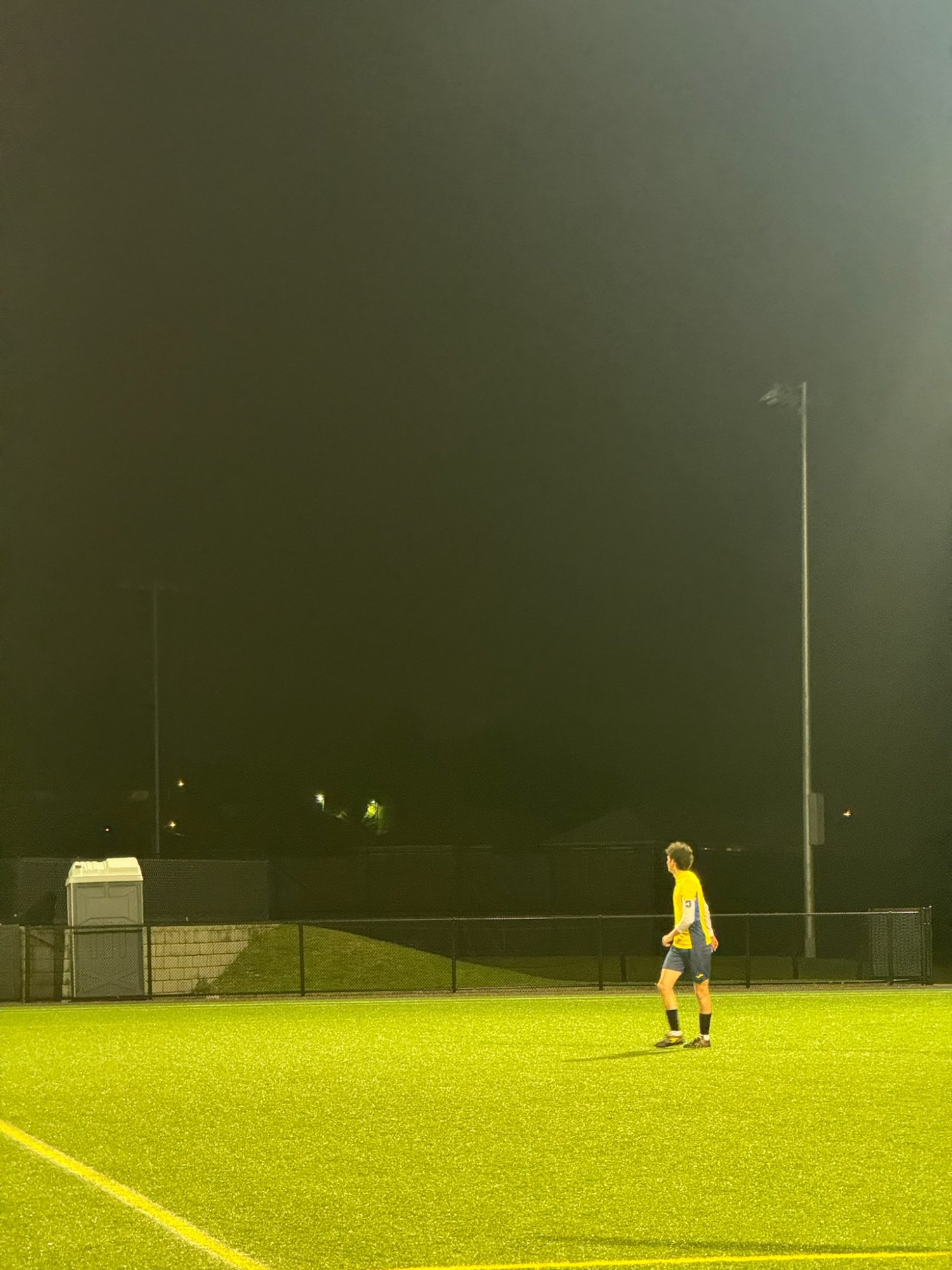 Goalkeeper under lights